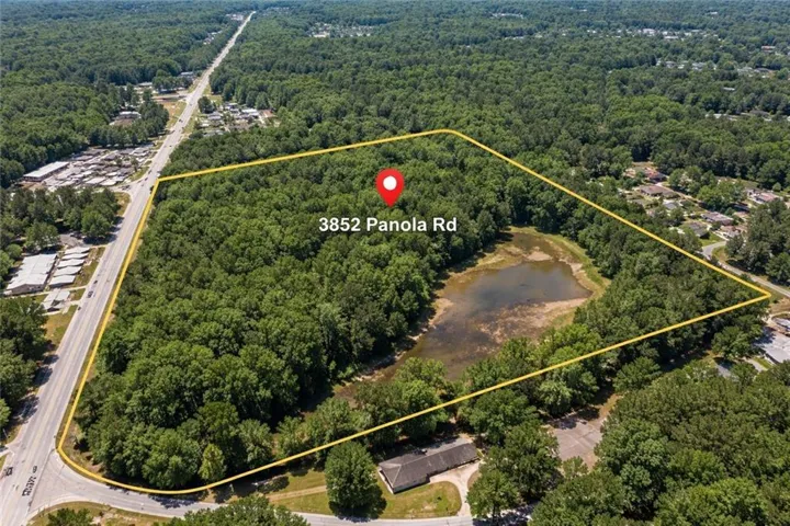 View of property location featuring a nearby body of water and property parcel outlined