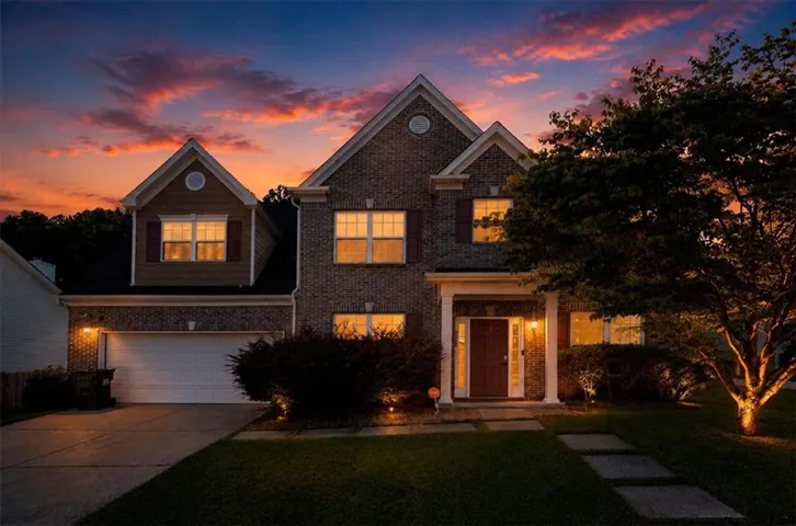Traditional brick exterior with architectural gables
