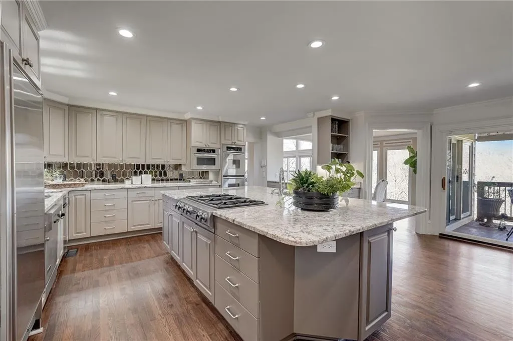 Kitchen view to dining & deck