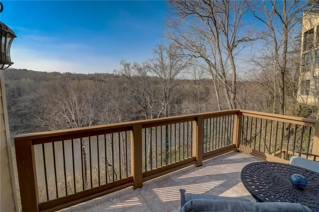 Primary bedroom deck view of river