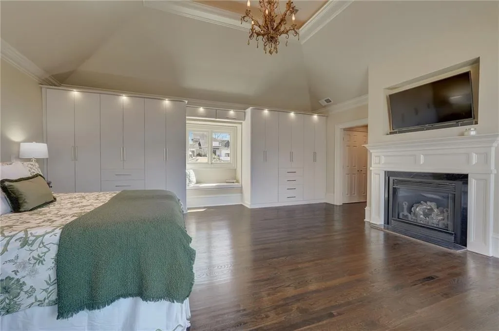 Primary Bedroom with new custom built-in wardrobe and reading nook