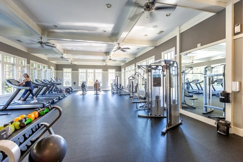 Gym with coffered ceiling and recessed lighting