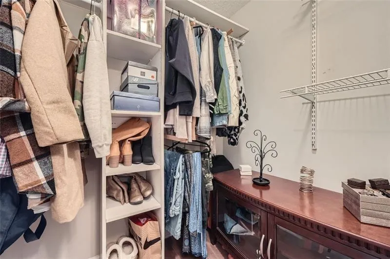 Spacious closet with wood finished floors