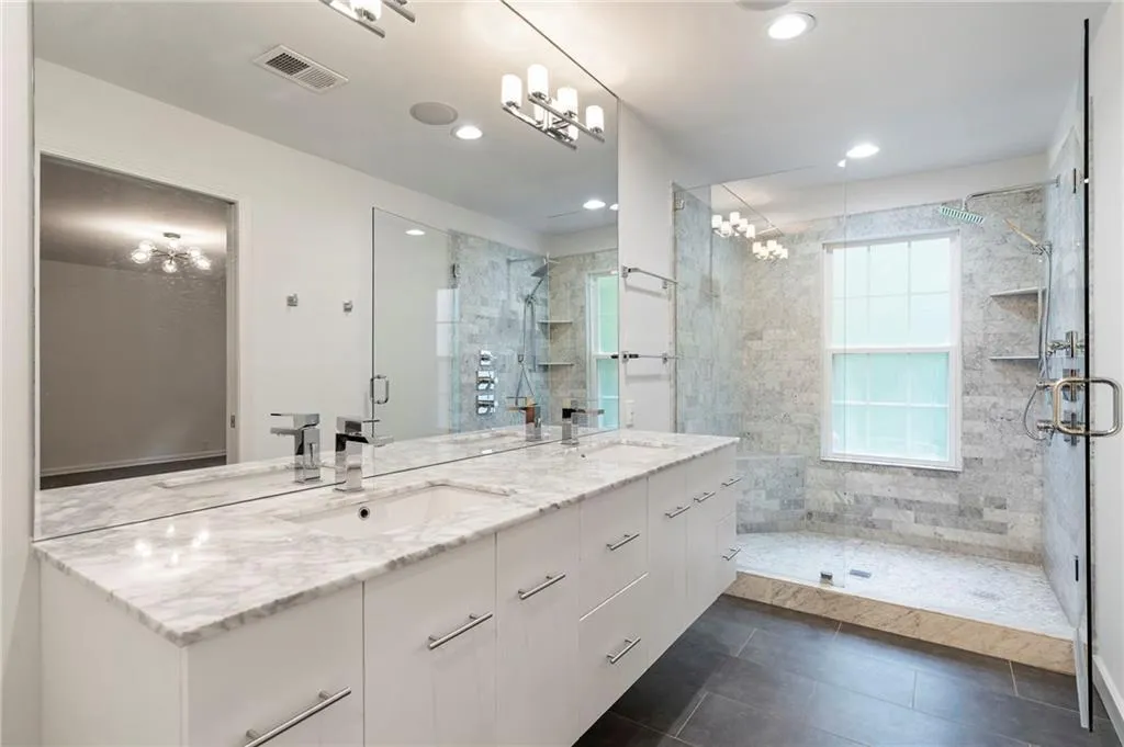 Walk in shower, double vanity, recessed lighting, complete the primary bath