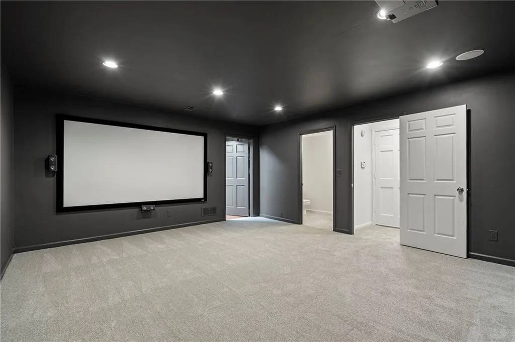 A large storage room and half bathroom round out the basement