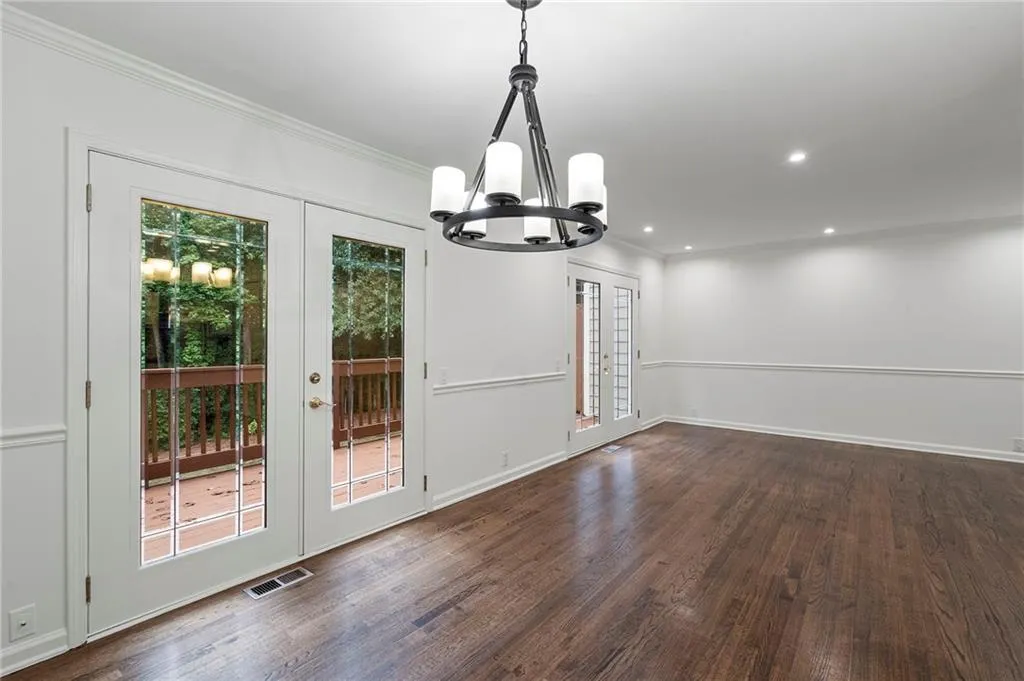Double glass doors to the patio provide an abundance of natural light