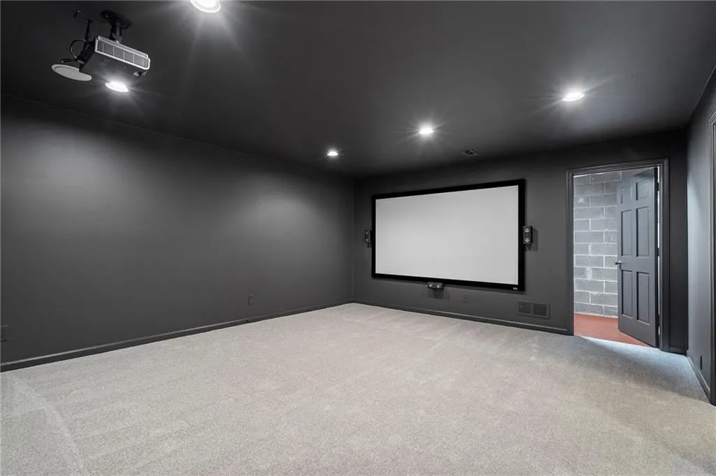 Basement rounds our the home offer the perfect space to play or  stay in for movie night