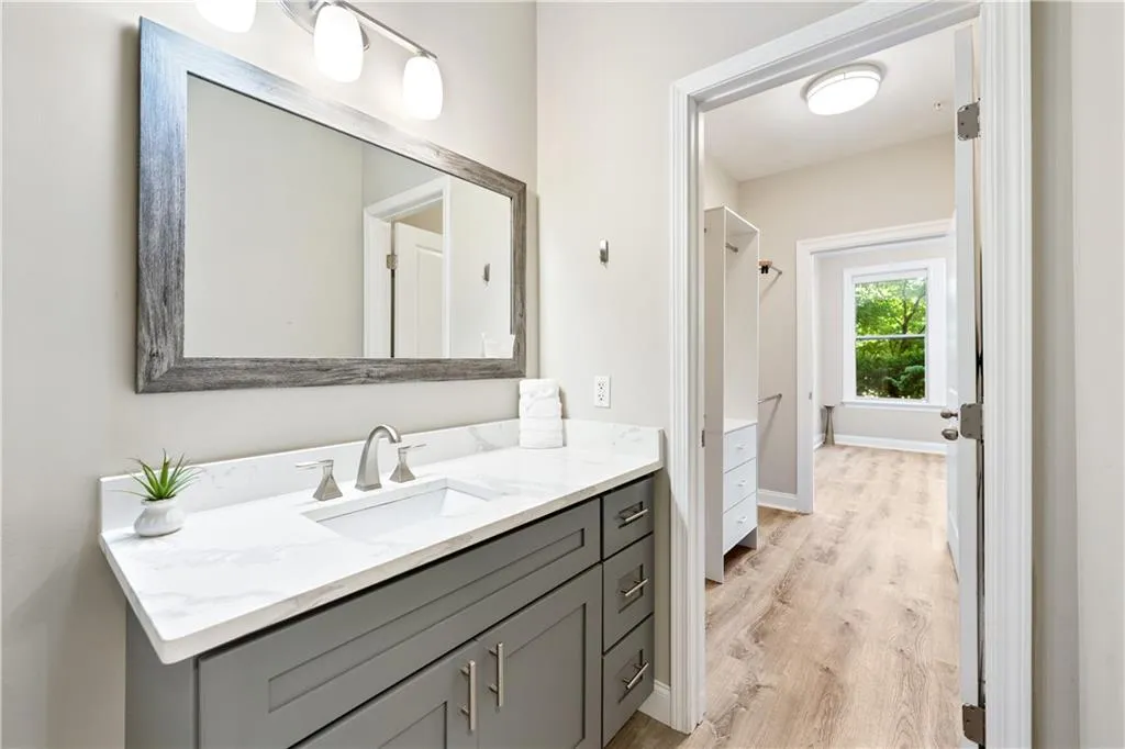 Bathroom with vanity and light wood-style flooring