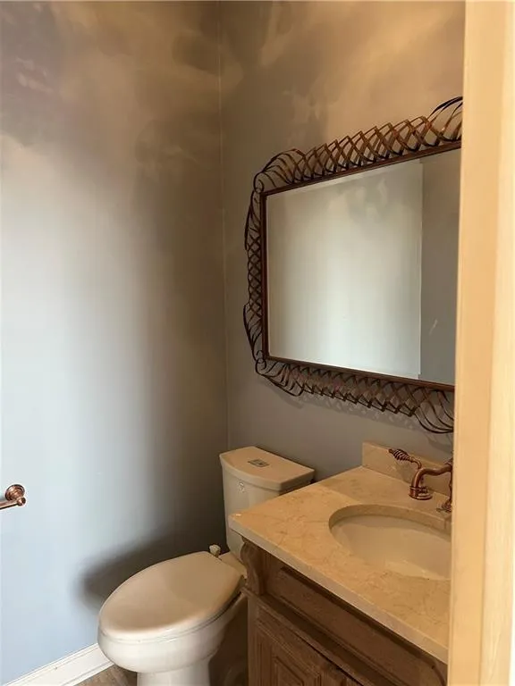 Half bath with toilet and vanity