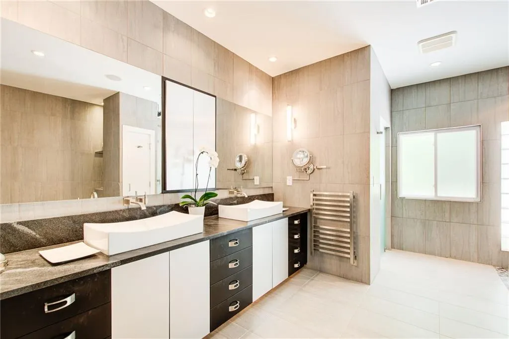 Every bell and whistle! So well designed. Even a bidet in the separate water closet.