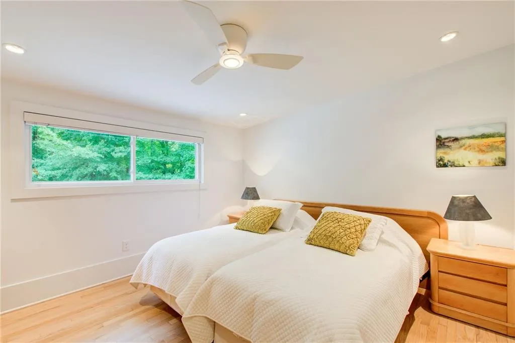 Upstairs bedroom with large walk in closet and walk in attic storage.