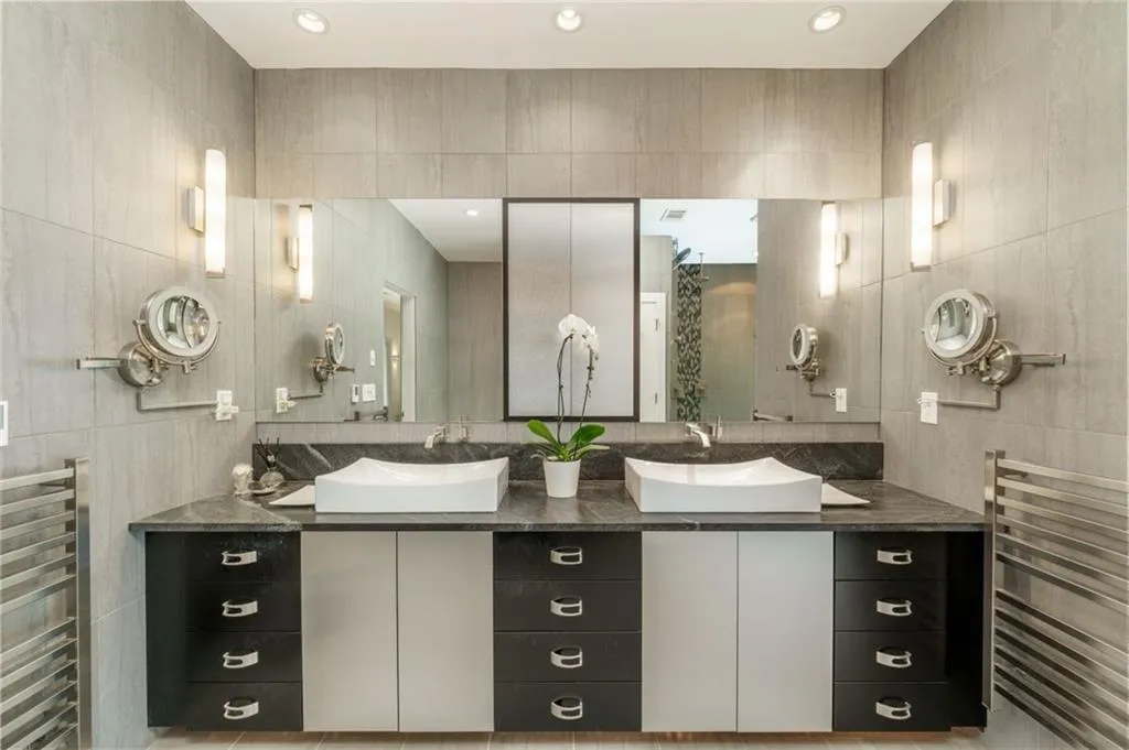 Primary bath with magnifying mirrors, heated floor, two towel warmers, medicine cabinet, bidet-you name it!