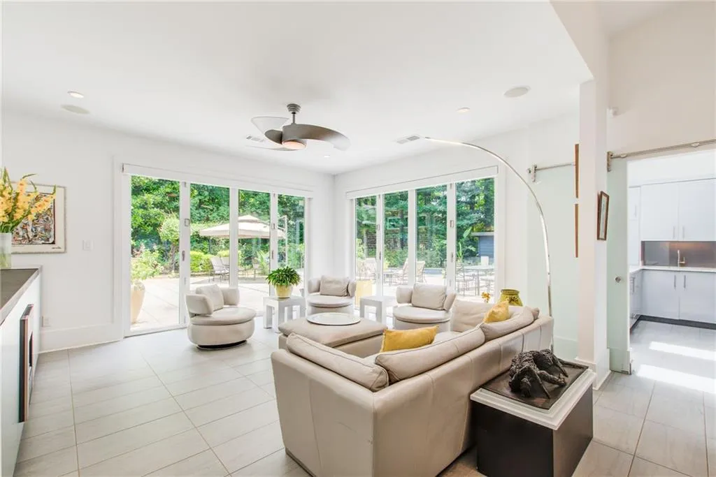 The family room has electric blinds and a fireplace that can heat the whole room. You will love this room all year round!