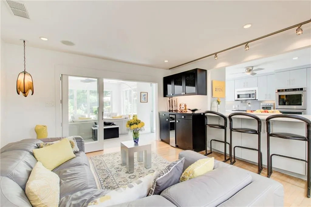 Cozy keeping room open to the kitchen, dining room and family room. Bar cabinets and tons of storage in the breakfast bar.