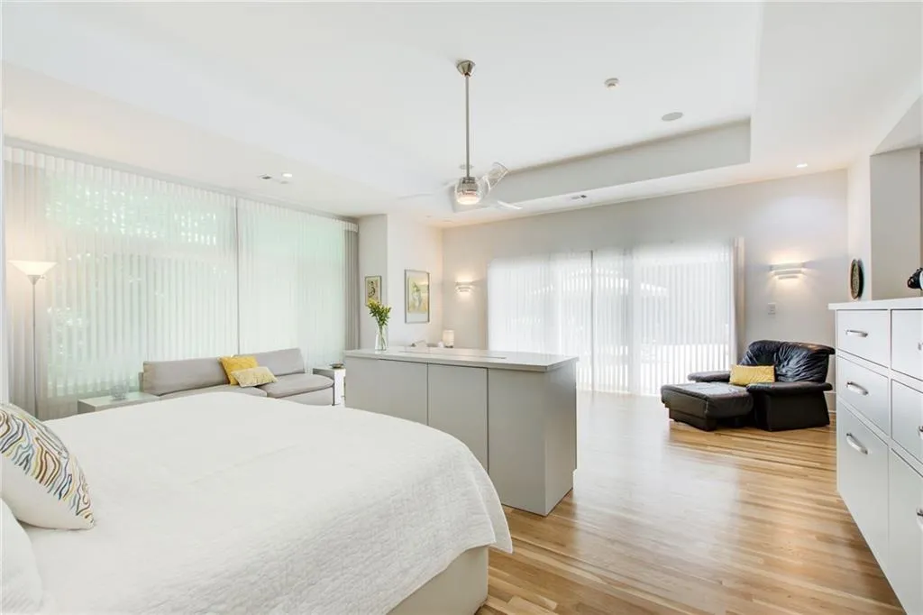 This cabinet houses the large TV that pops up with one click for late night viewing. We never want to block the view of the pool for very long.