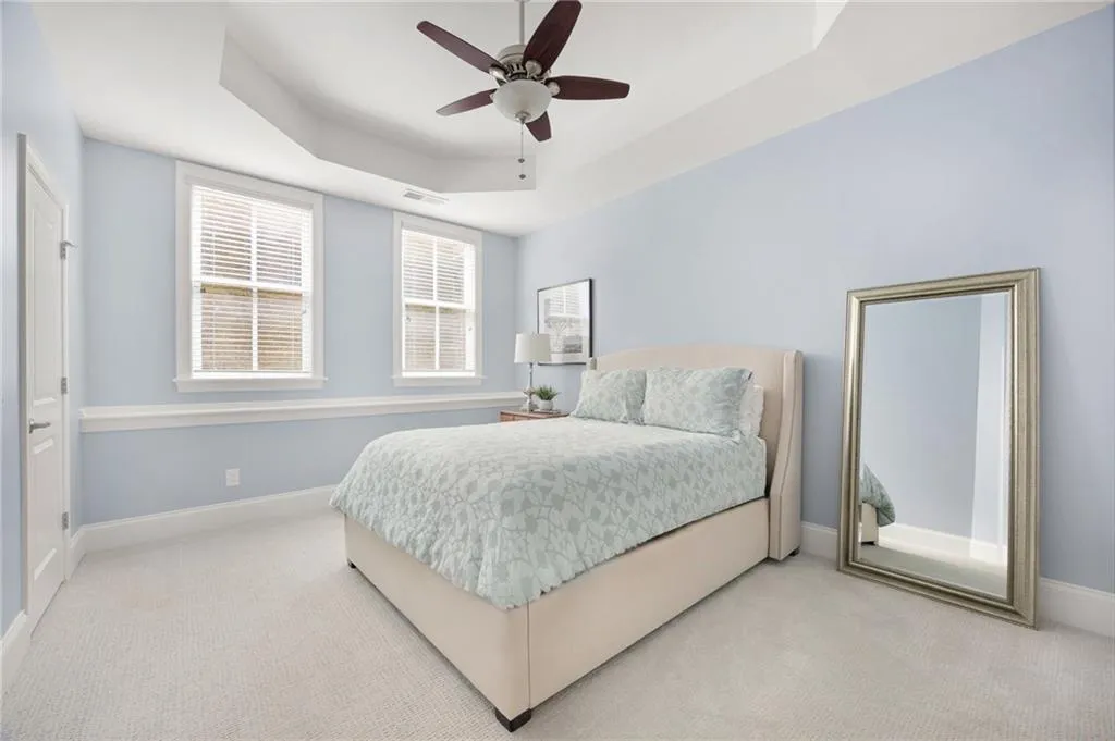 Guest Bedroom Basemequartz countertops, stainless steel appliances, viking, marble octagonal tile backsplash, hardwood floors, crown molding, ten foot ceilings, custom built-ins, custom moldings, fireplacent