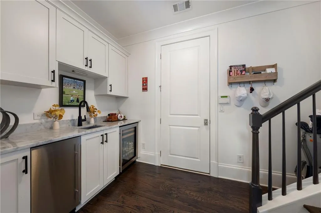 Downstairs beverage area for easy access to outdoor patio area
