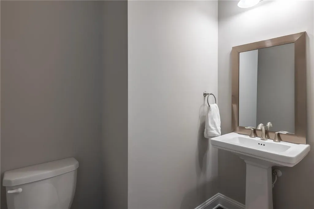 Half bathroom featuring toilet