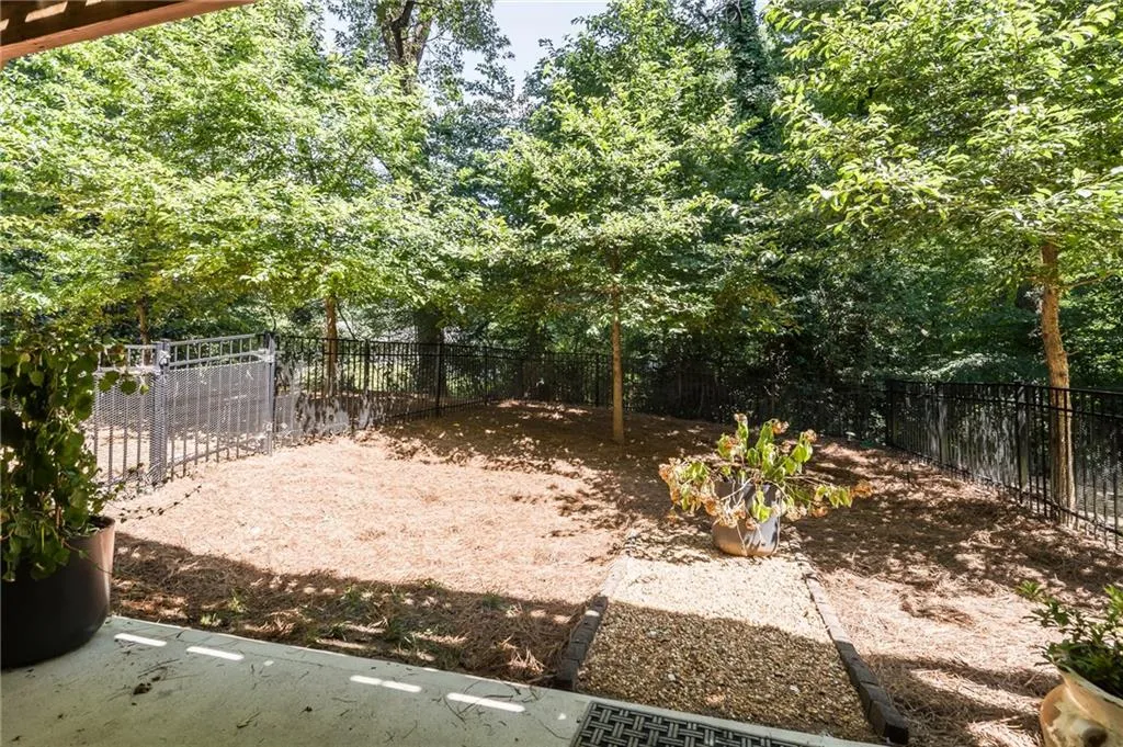 View of fenced backyard