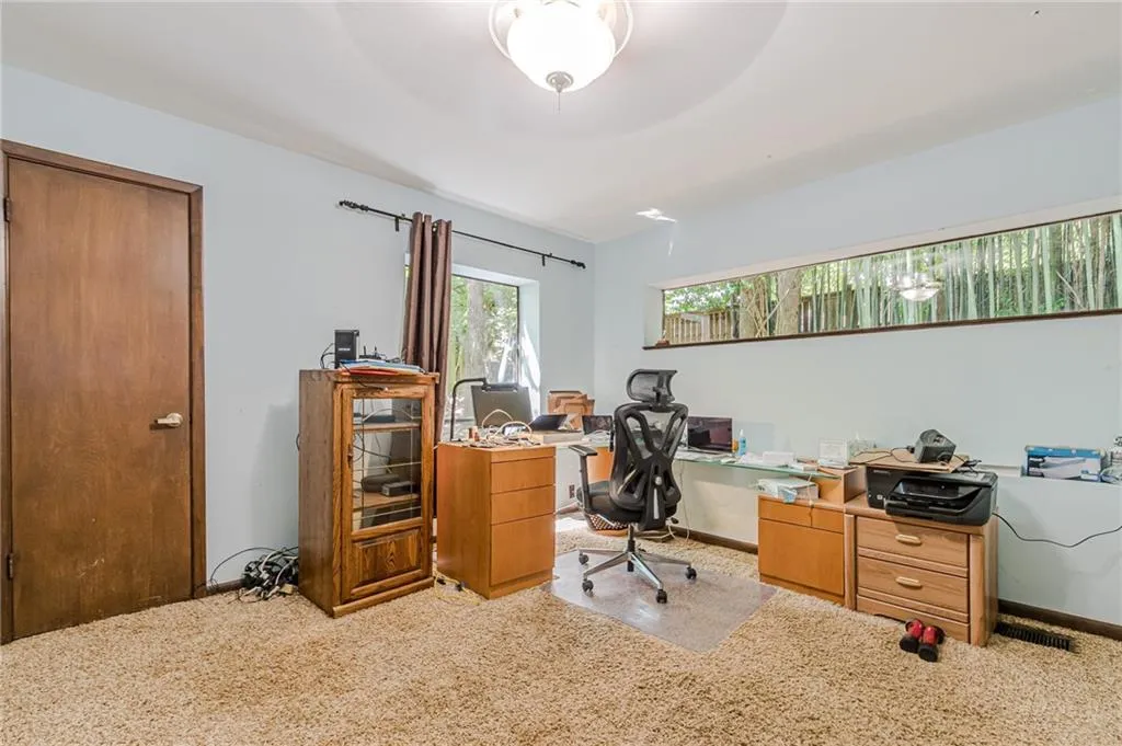 View of carpeted home office