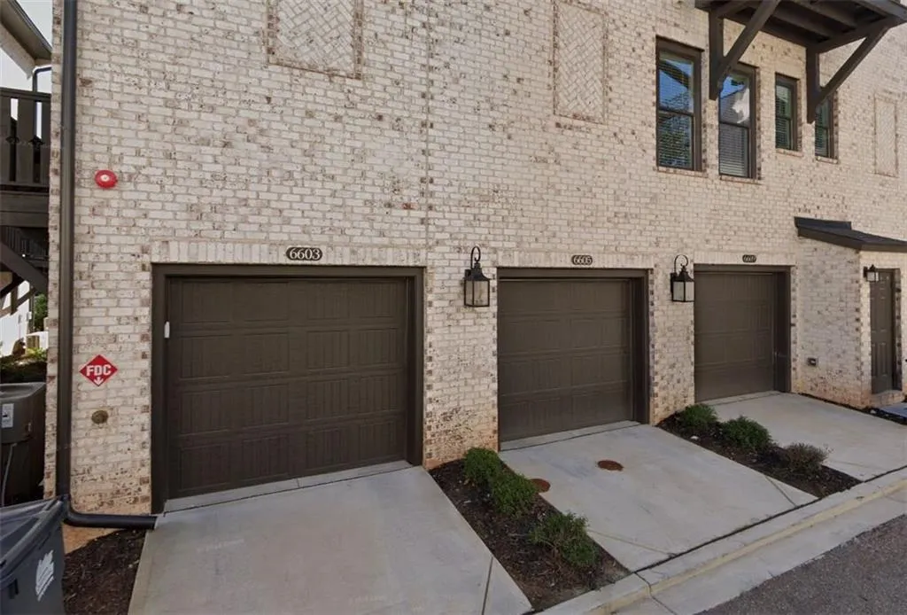 Garage with concrete driveway