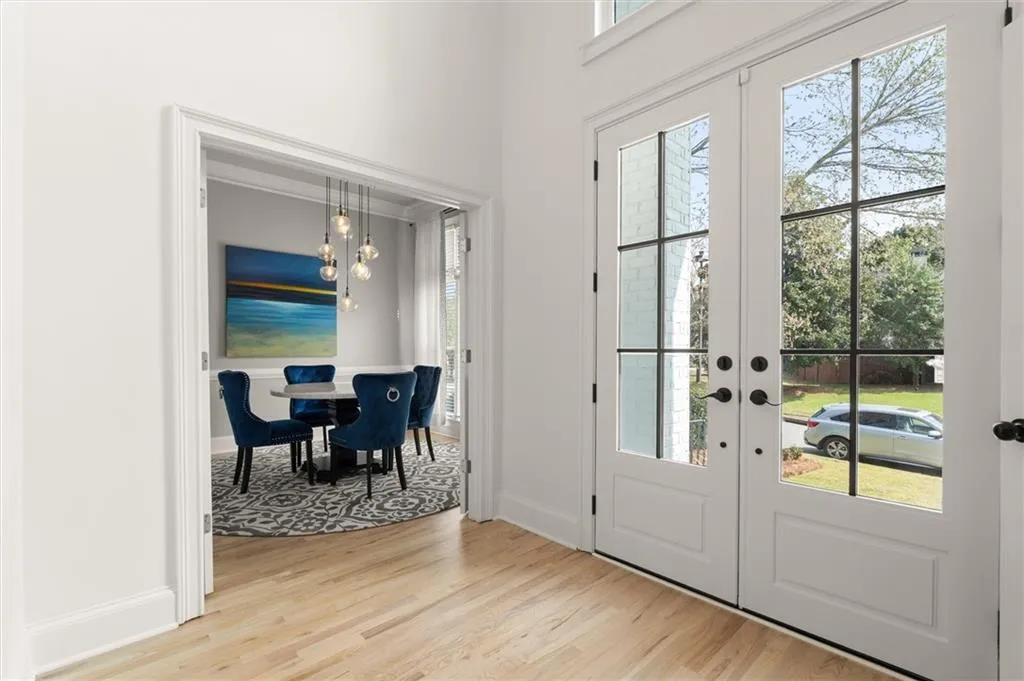 Foyer entrance featuring hardwood floors throughout
