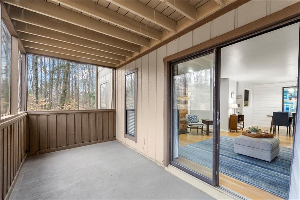 Screened porch off of the family room