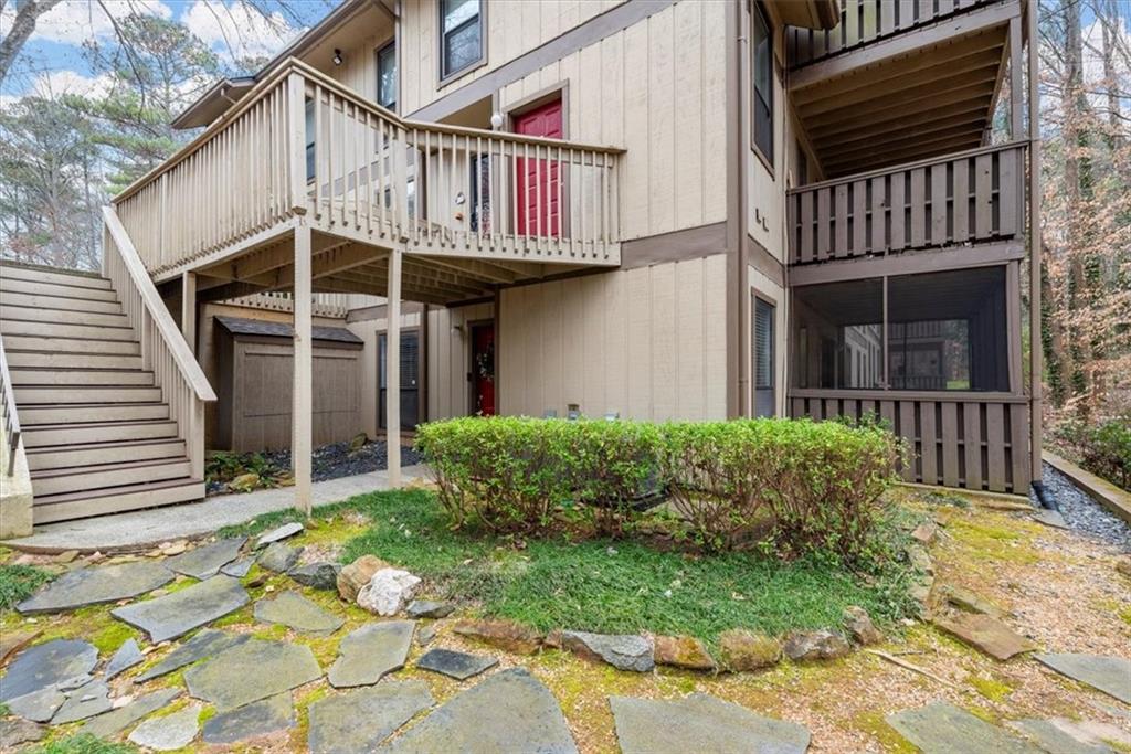 View of entry area and rear view of house