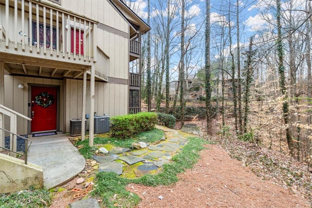 View of entry and view of woods