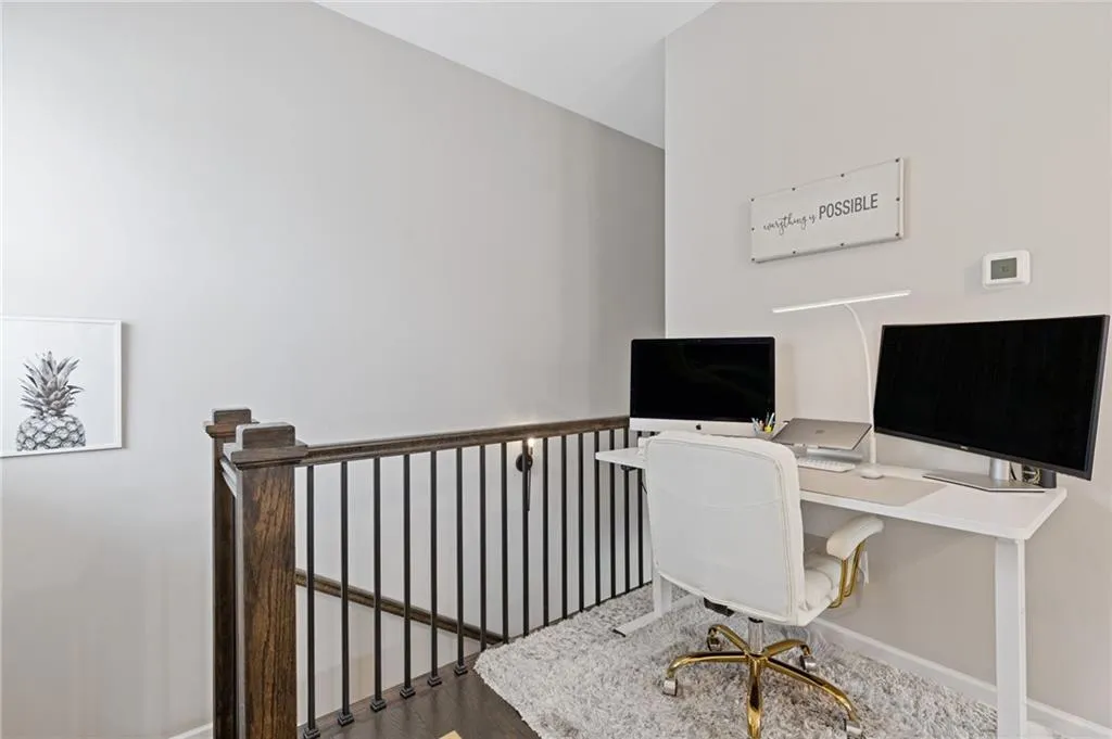 Office featuring wood finished floors