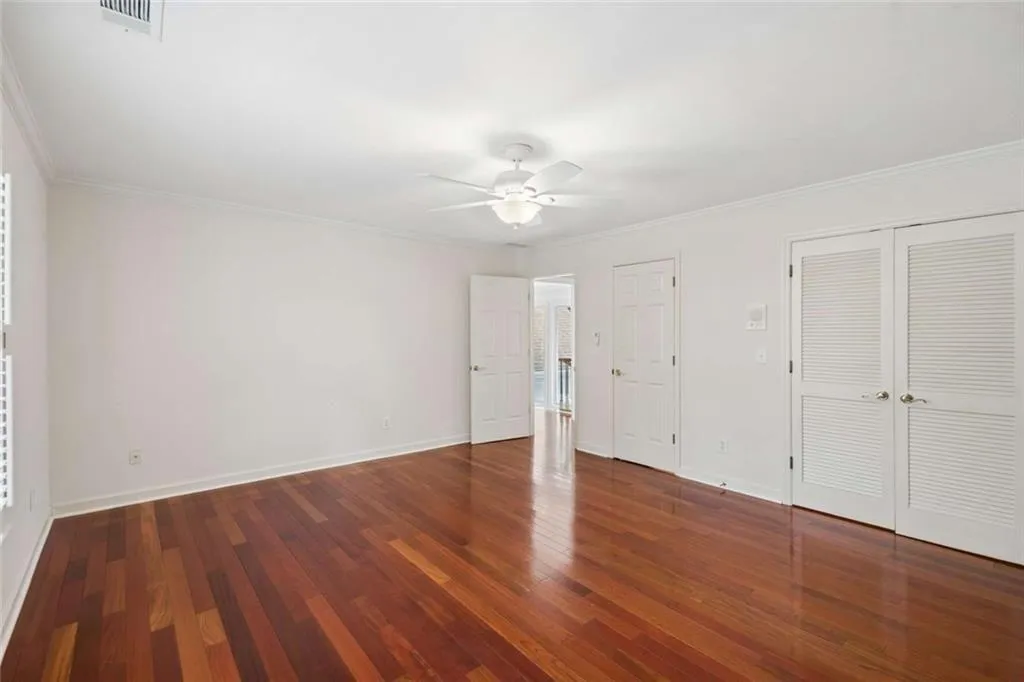 One of three gracious upstairs bedrooms.