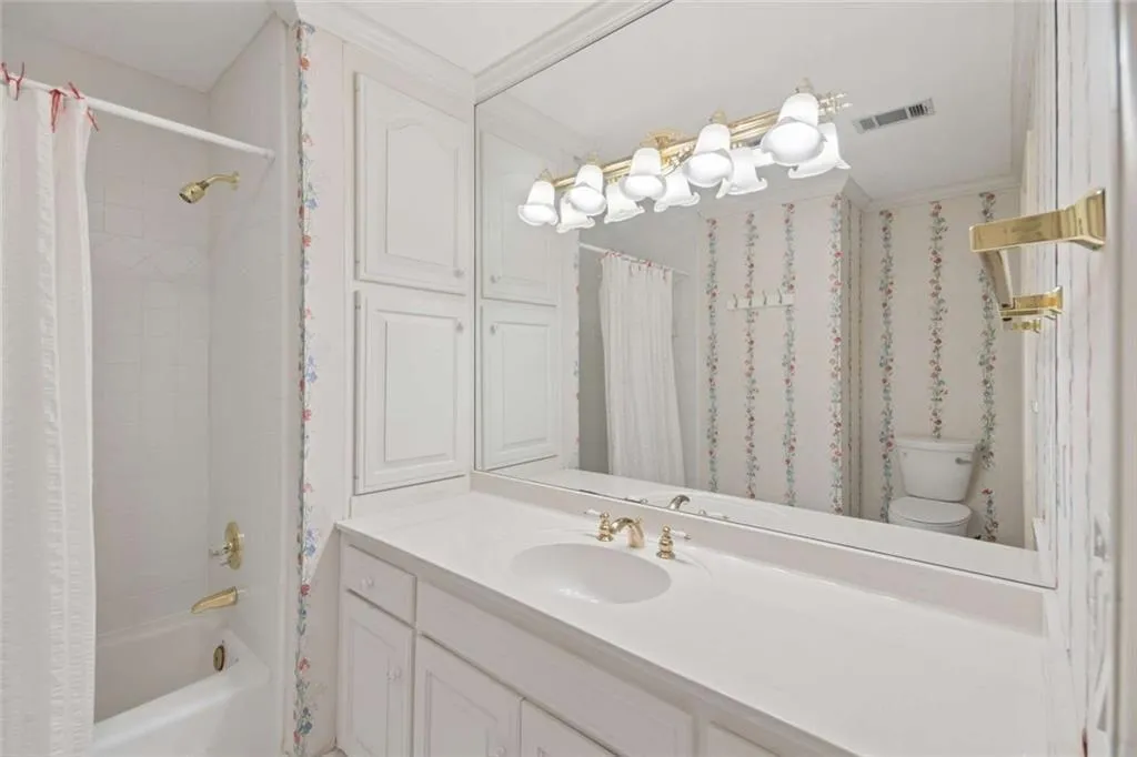 One of three upstairs en suite bathrooms.