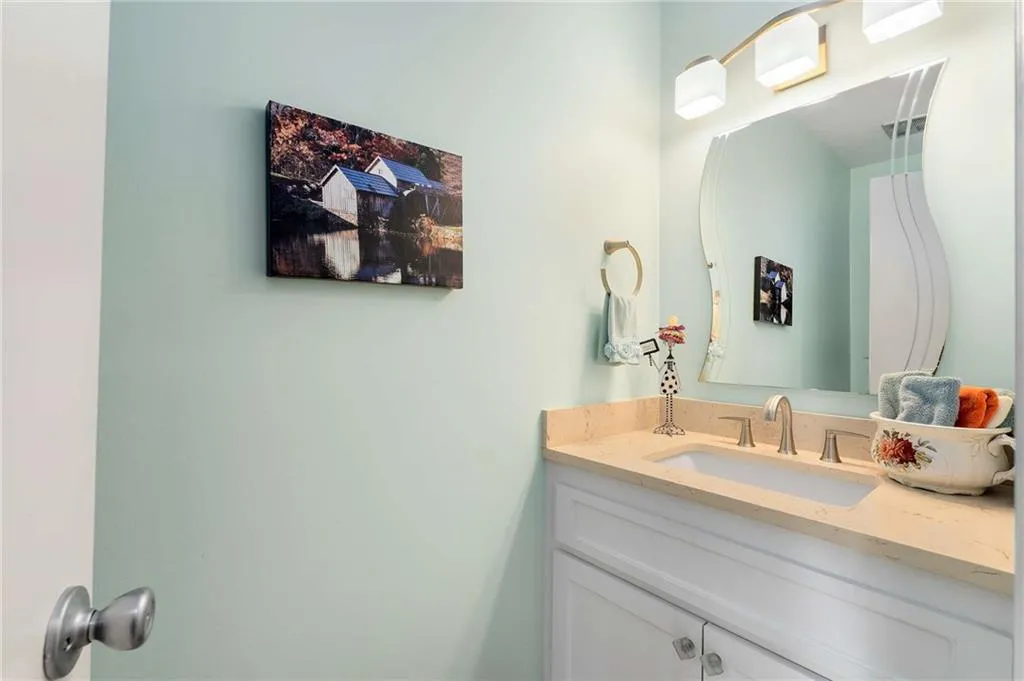 Half bathroom off the entry hall.