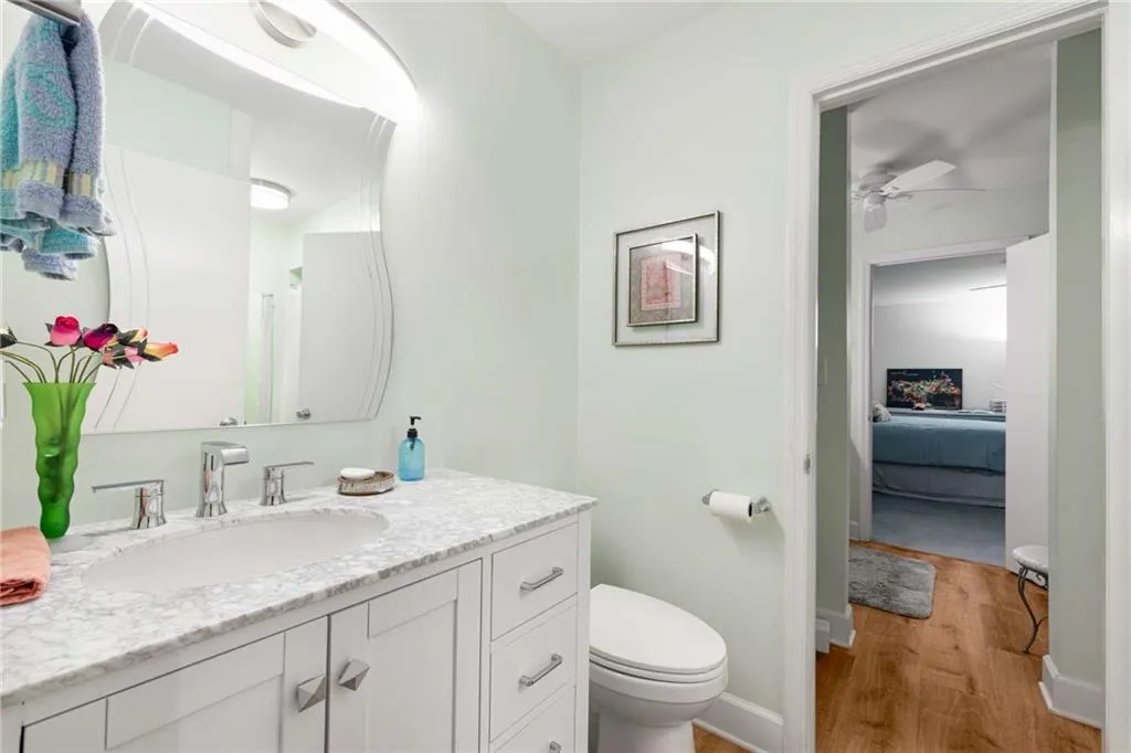 This full bath connects to the smaller bedroom.  It has a shower and is also where the laundry is located.
