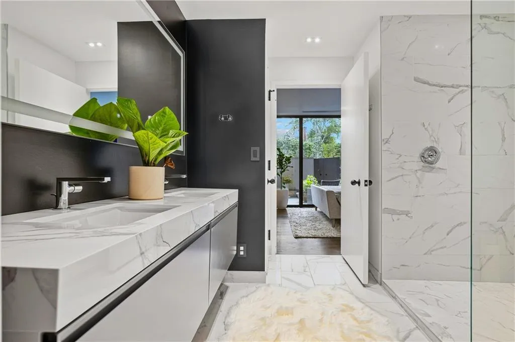 Dual vanity with integrated rectangular sinks, stone-look countertop, and single-handle faucets