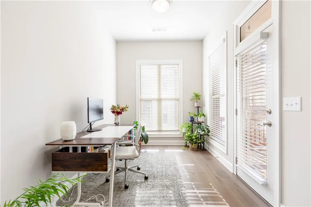 Office space featuring wood finished floors