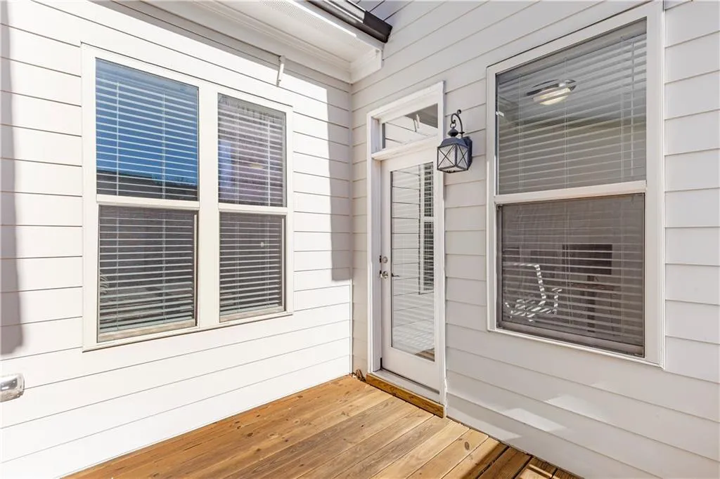 Entrance to property featuring a deck