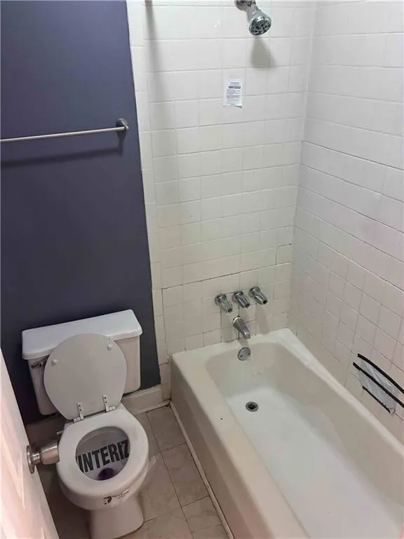 Closer view of the shower / tub combination Closer view of the shower / tub combination