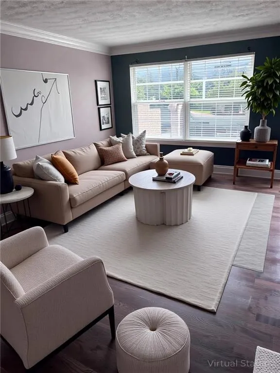 VIRTUALLY STAGED: Living room featuring crown molding, wood finished floors, and a textured ceiling