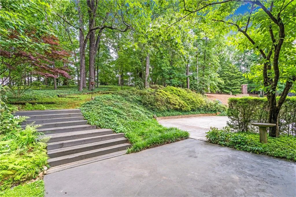 View of home's community with a patio area