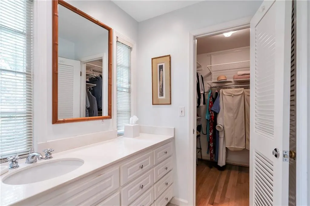 Bathroom featuring hardwood / wood-style floors and vanity