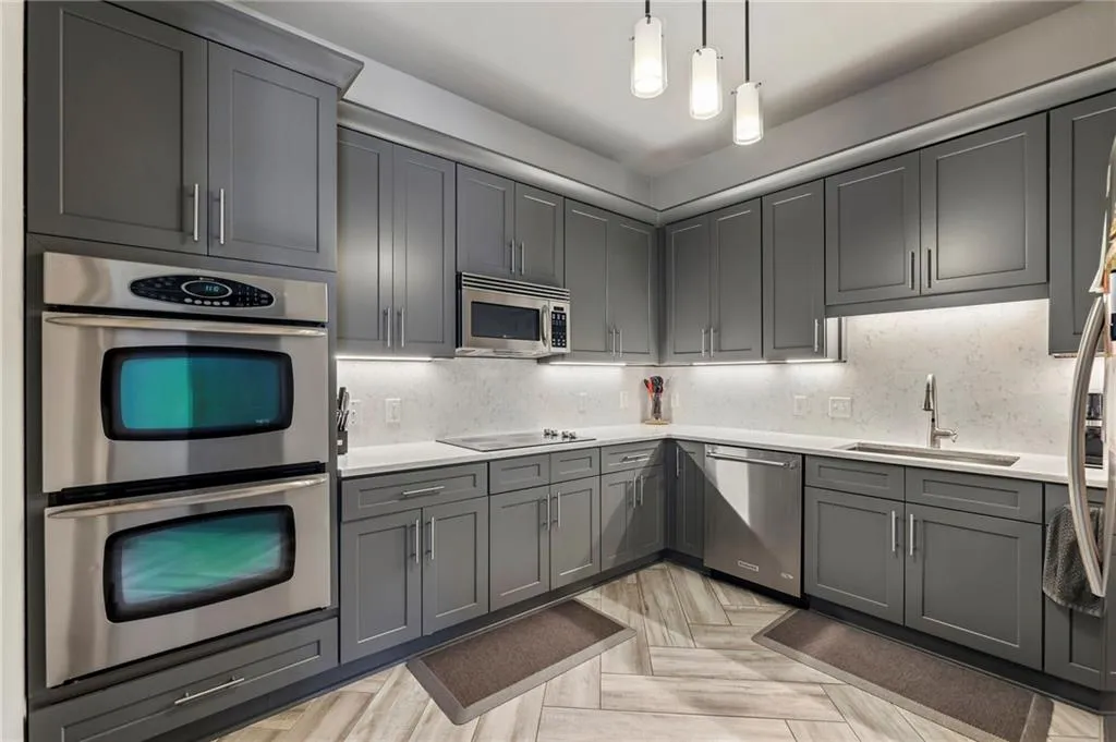 Gorgeous, renovated kitchen with double ovens, pantry and tons of counterspace