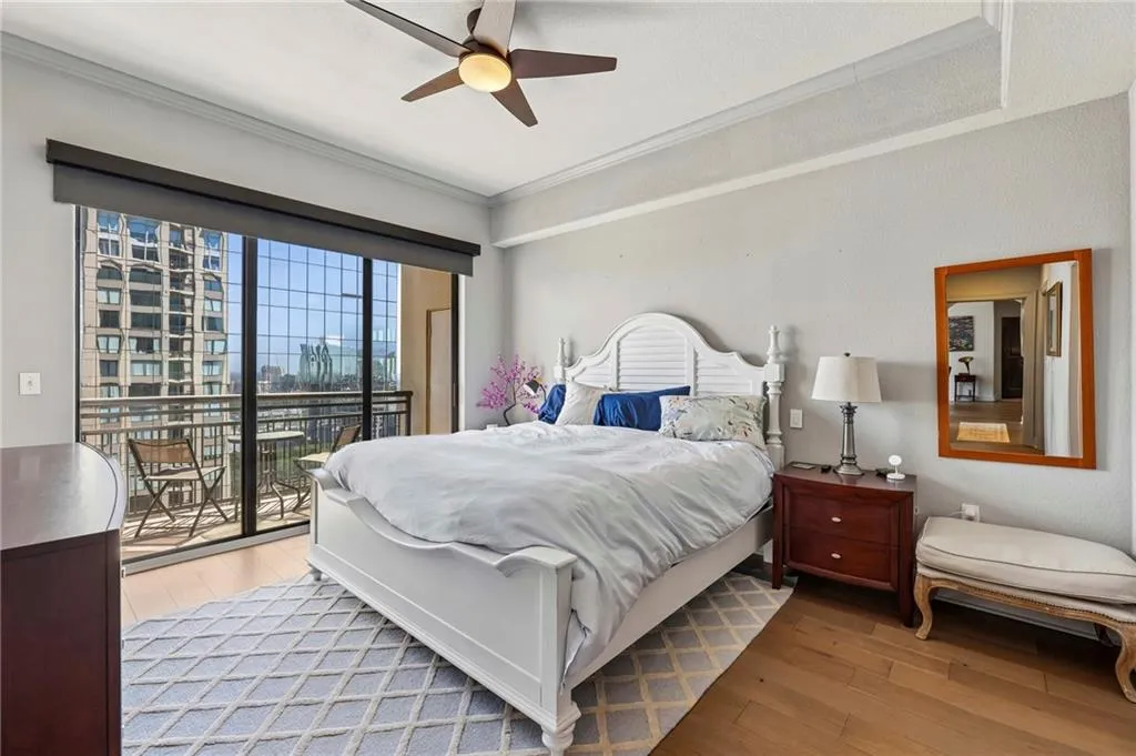 Primary bedroom with private balcony