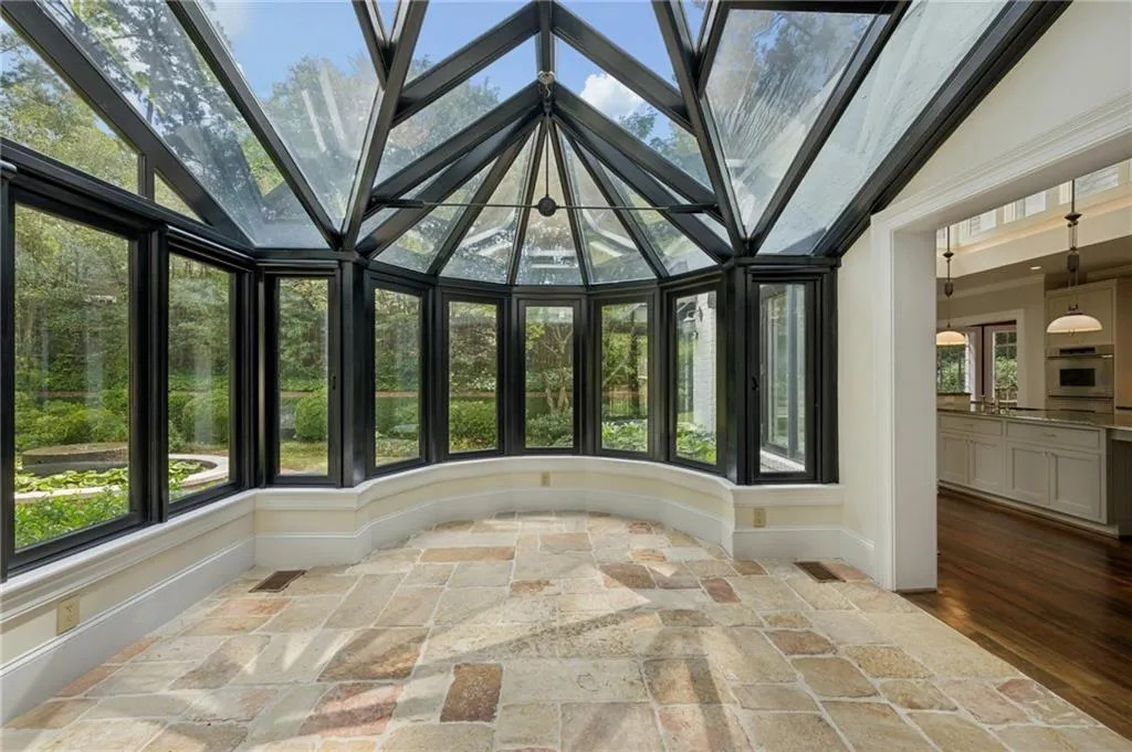 Conservatory off of kitchen and family room