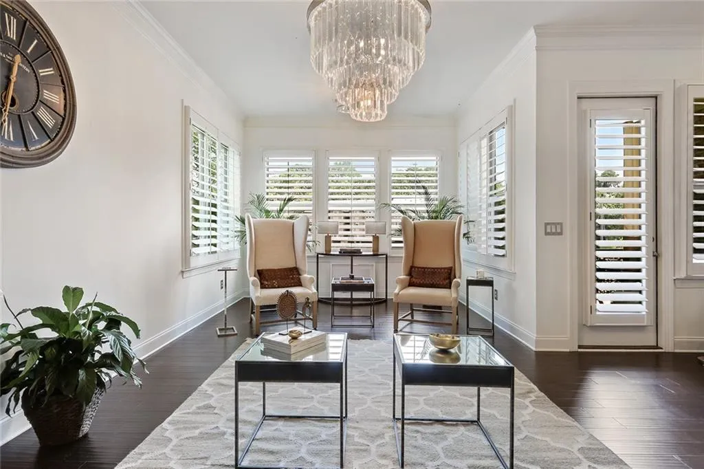 Light-filled living room with plantation shutters.