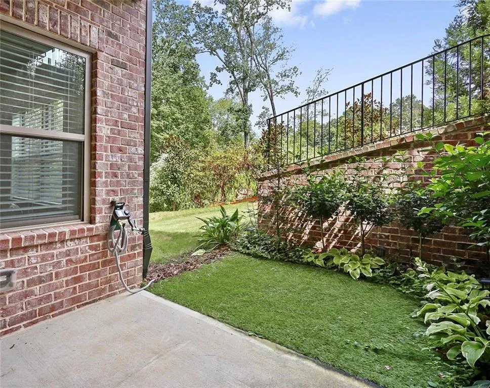 Outdoor patio space from terrace level.