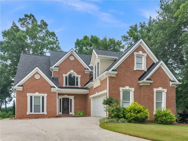 Brick exterior with white trim details