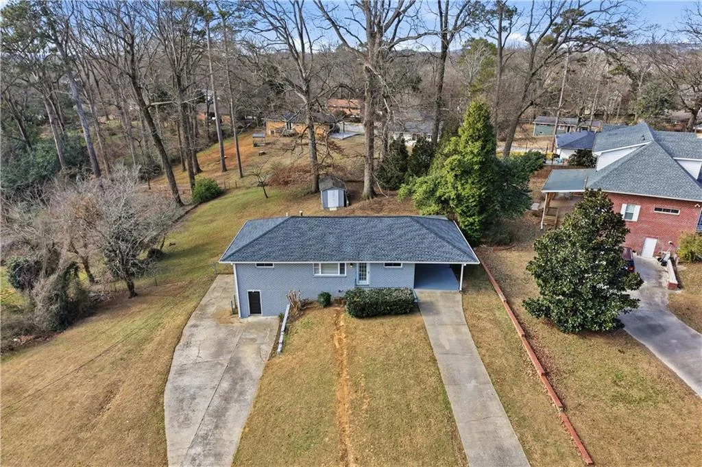 Drone / aerial view of a tree filled landscape