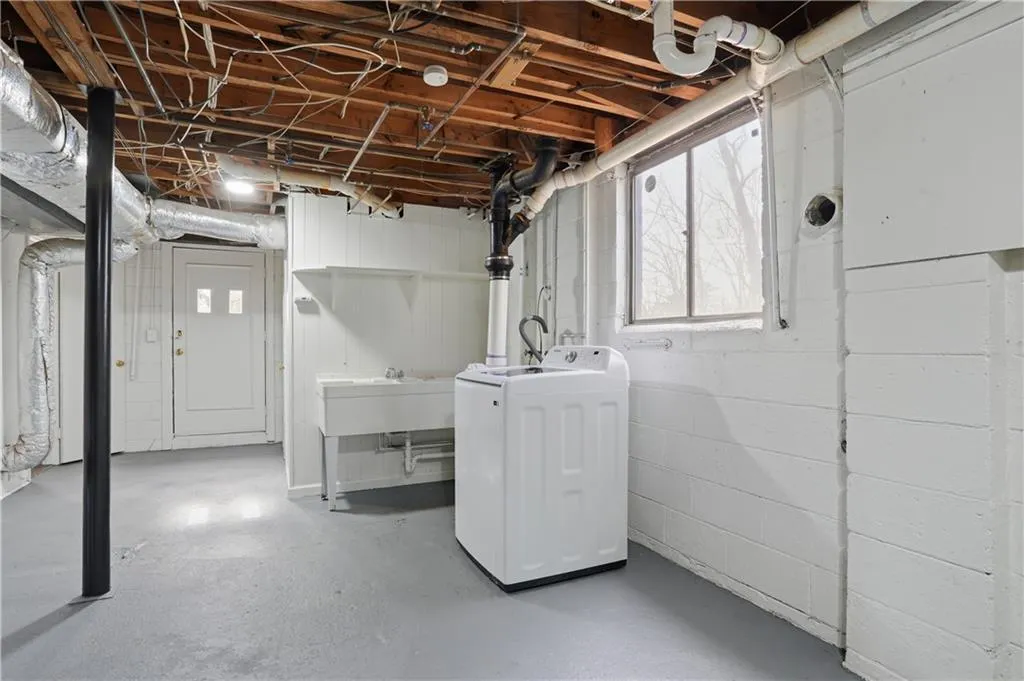 Basement featuring laundry area