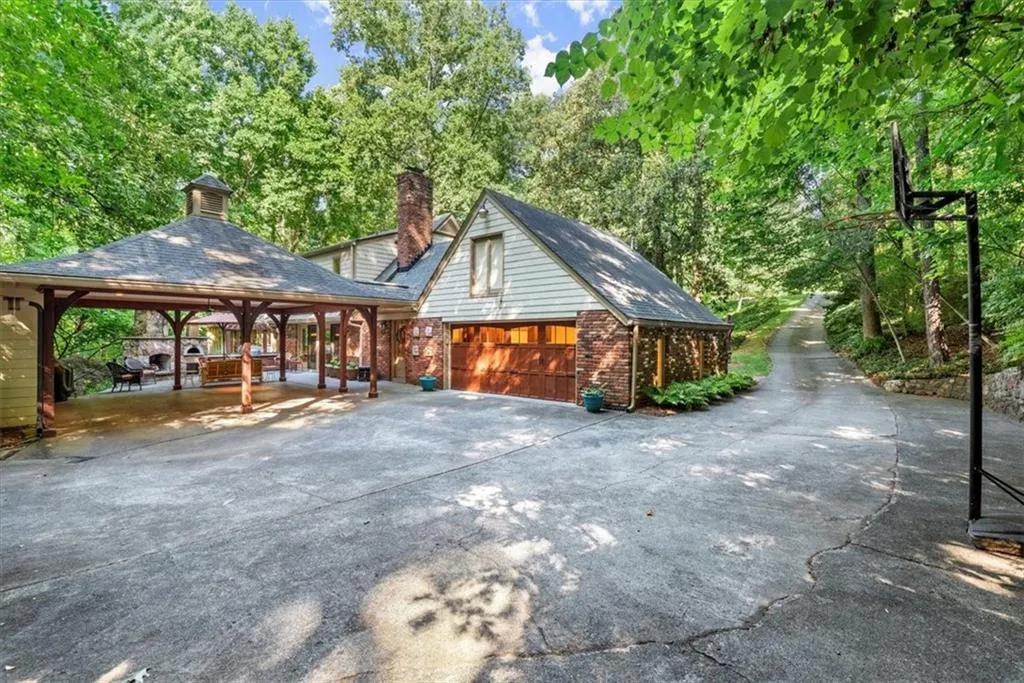 View of property exterior with a garage